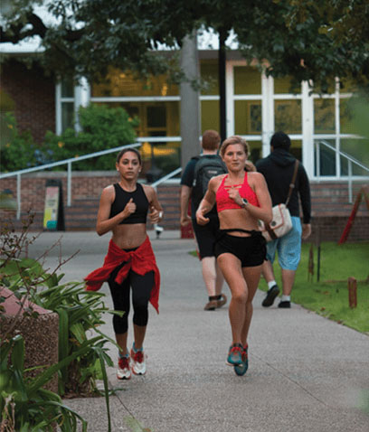 Female students running