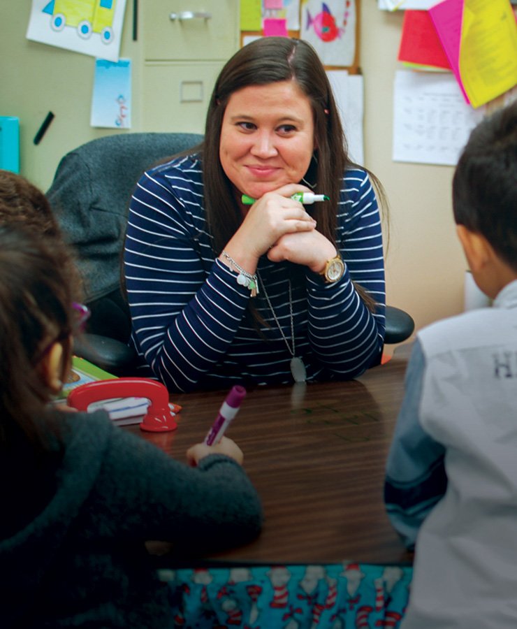 Female education student working with children