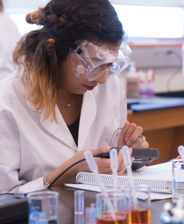 Female nursing student wearing goggles